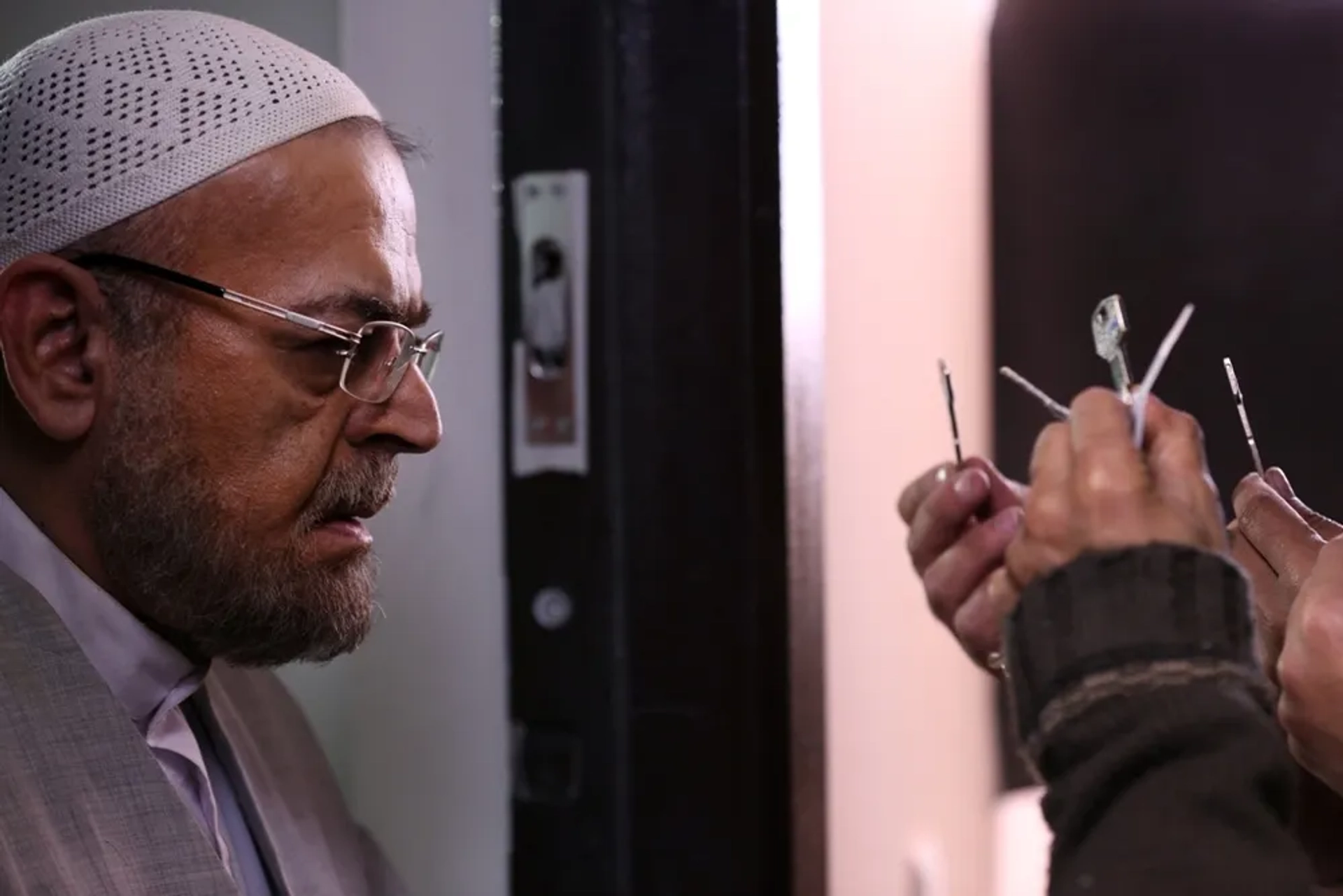 Hamid Lolayi in Three Strangers (2017)