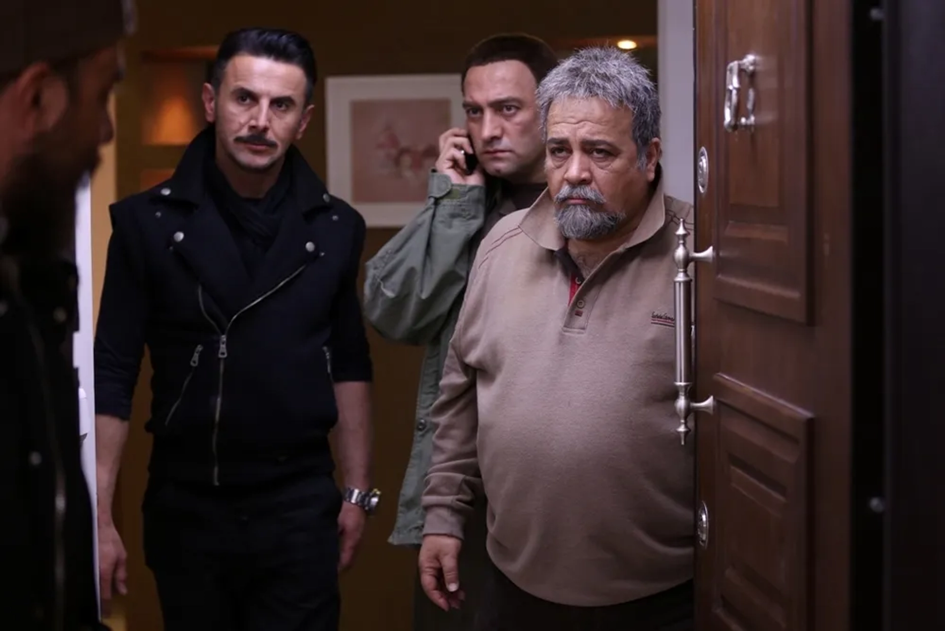 Mohammad Reza Sharifinia, Amin Hayayee, Majid Salehi, and Borzou Arjmand in Three Strangers (2017)