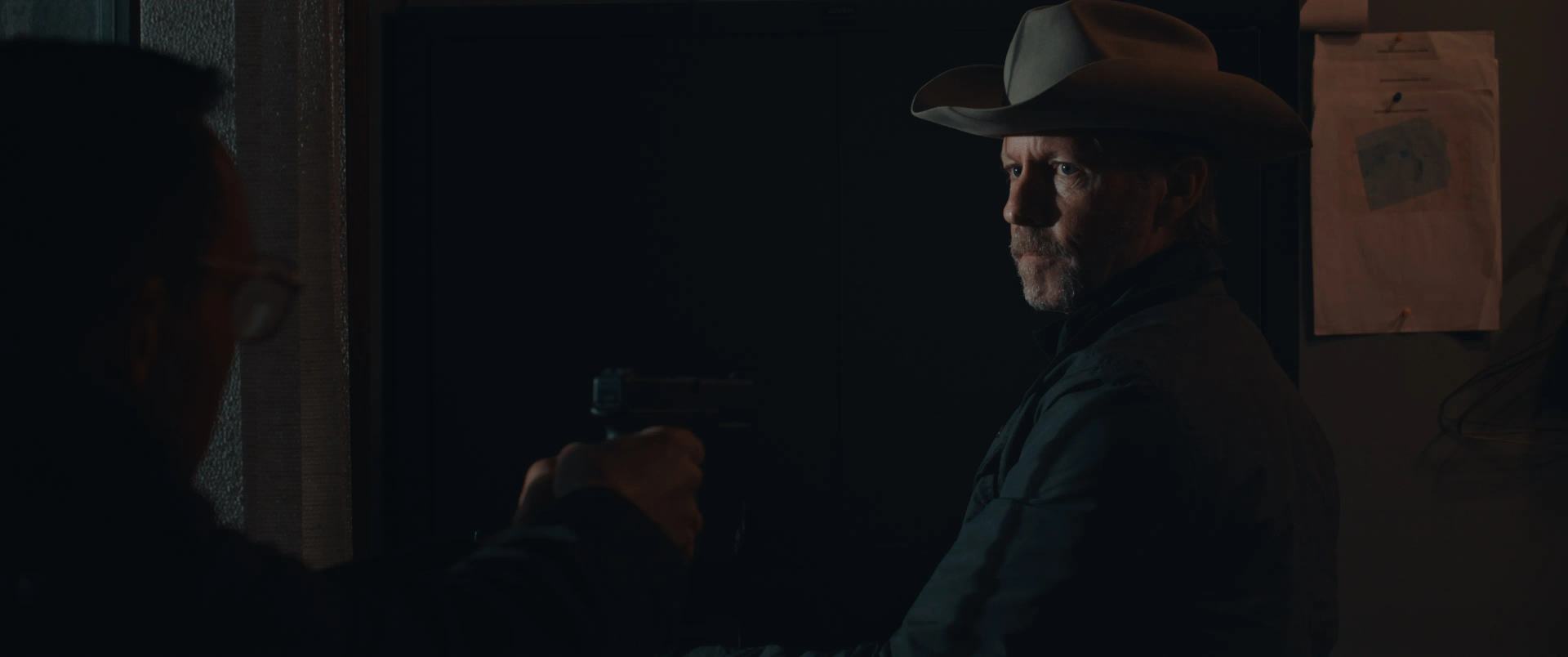 Mason Cromwell and Rick Amsbury in Armed (2025)