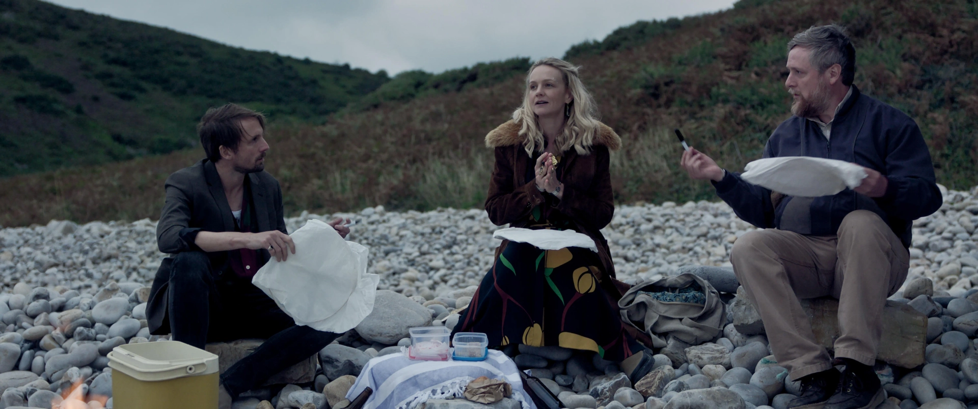Carey Mulligan, Tom Basden, and Tim Key in The Ballad of Wallis Island (2025)