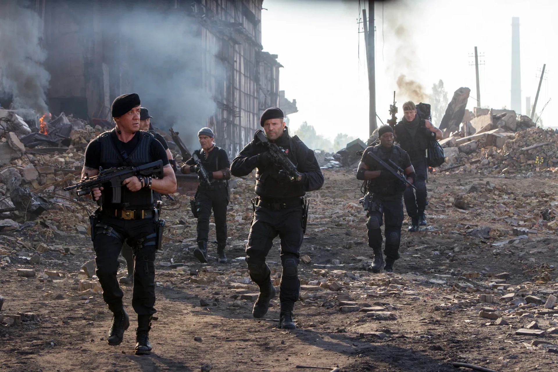 Antonio Banderas, Dolph Lundgren, Sylvester Stallone, Wesley Snipes, Jason Statham, and Randy Couture in The Expendables 3 (2014)