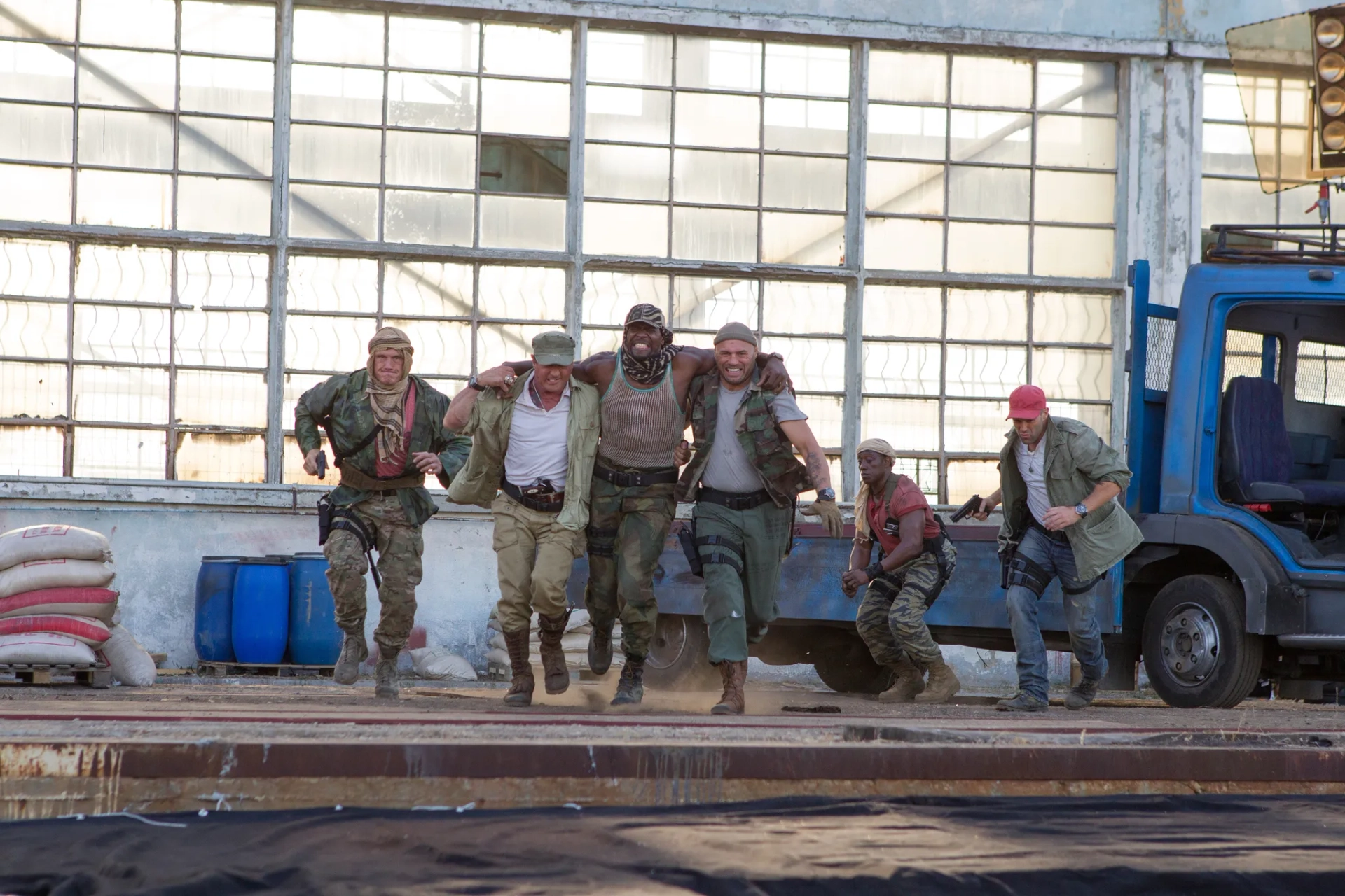 Dolph Lundgren, Sylvester Stallone, Wesley Snipes, Jason Statham, Terry Crews, and Randy Couture in The Expendables 3 (2014)