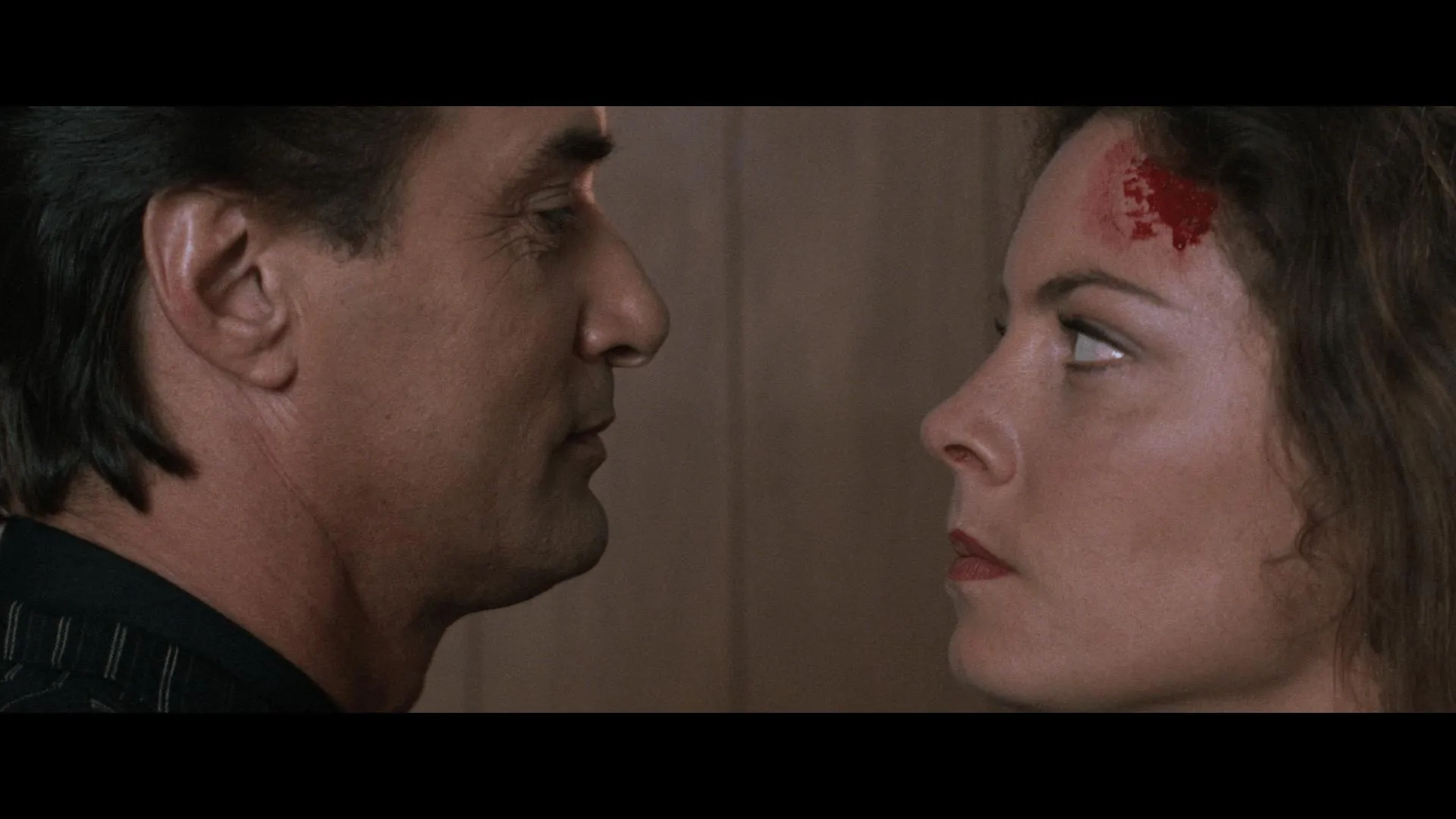 Rachel Blakely and Richard Norton in Mr. Nice Guy (1997)