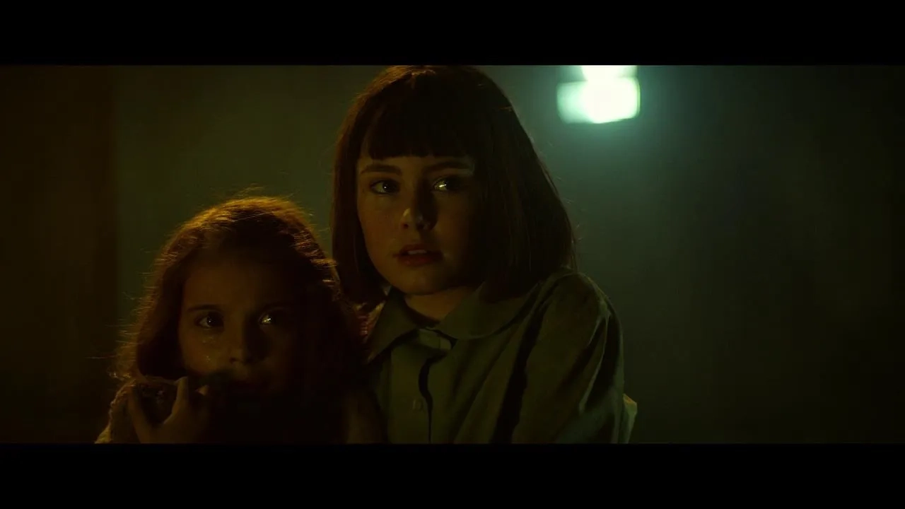 Amelia Crouch and Erica Tremblay in Extinction (2018)