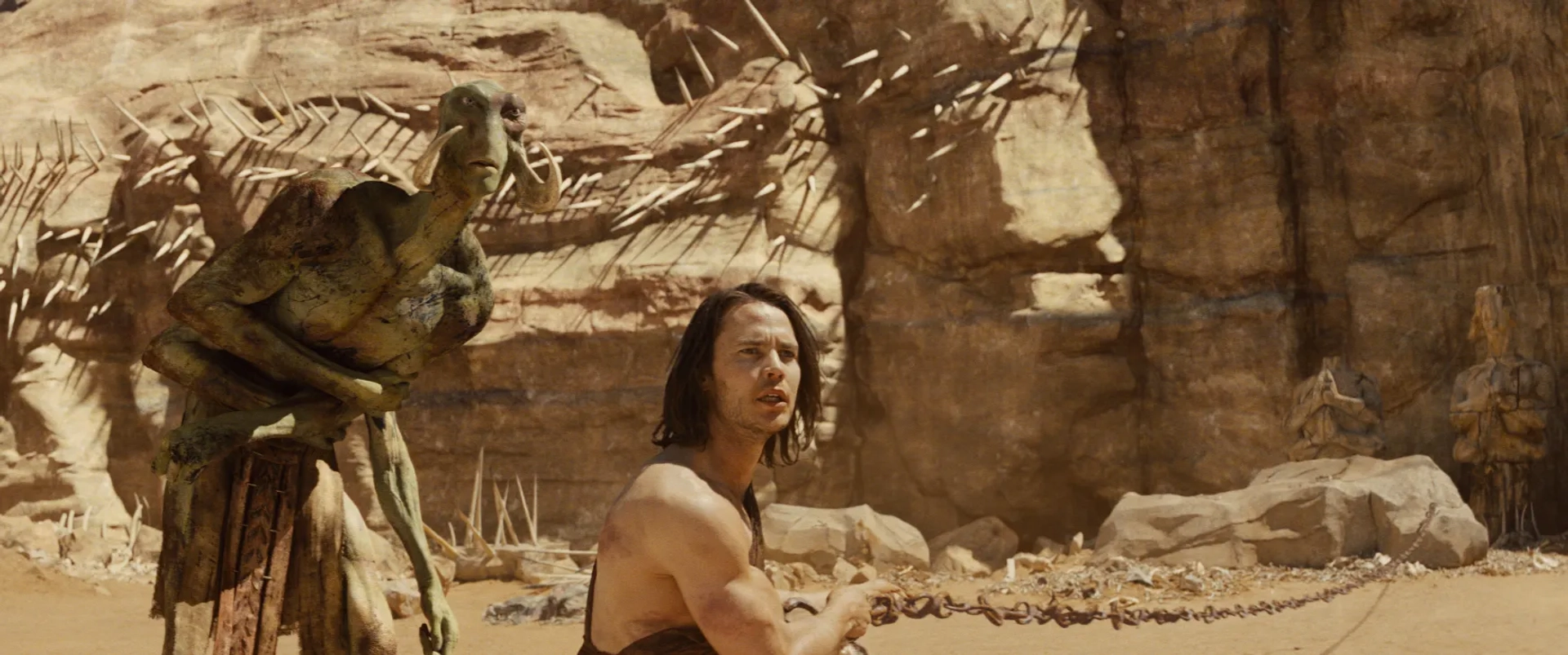 Willem Dafoe and Taylor Kitsch in John Carter (2012)