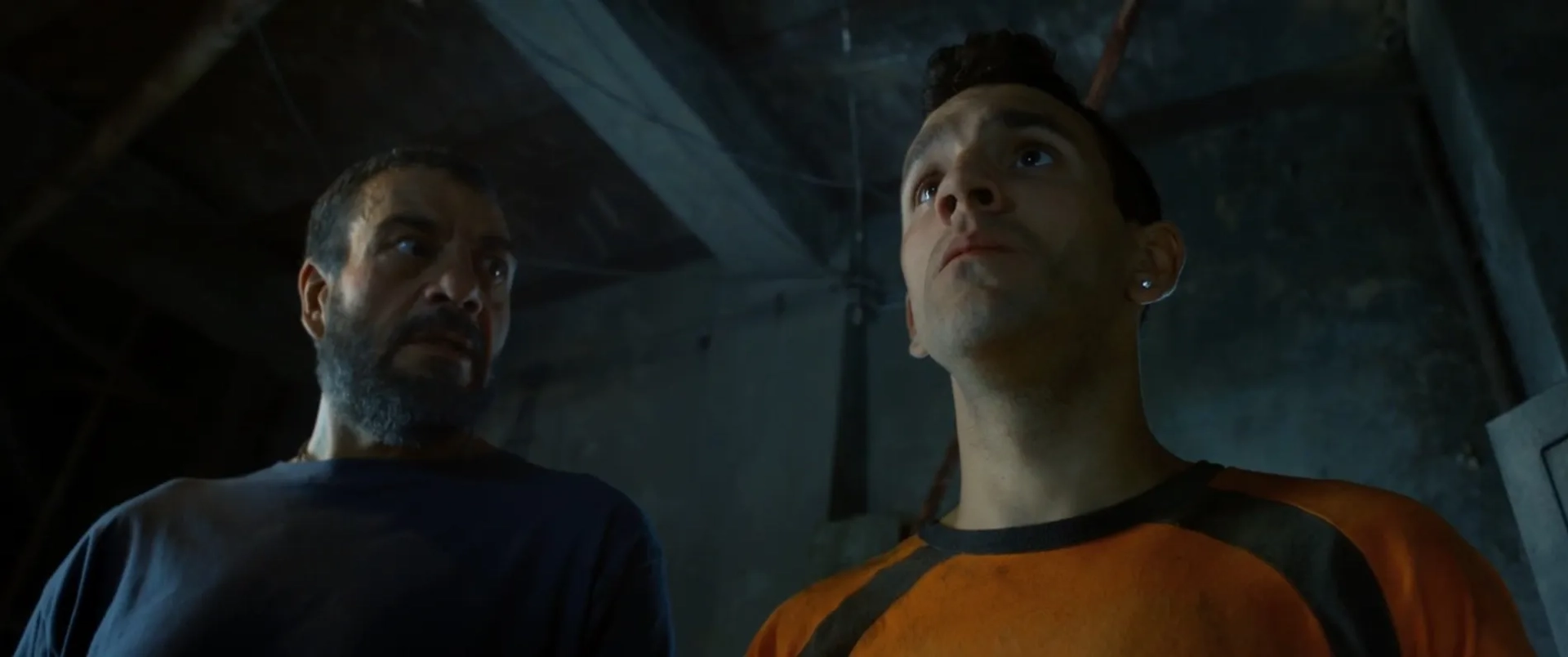 Walter Donado and Ariel Núñez Di Croce in At the End of the Tunnel (2016)