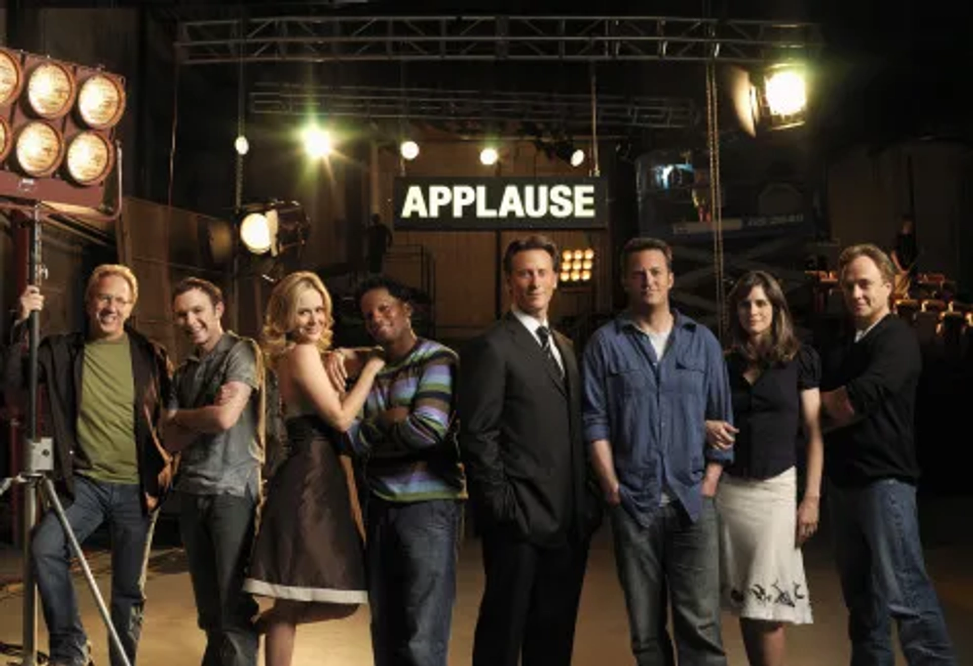 Amanda Peet, Matthew Perry, Steven Weber, Sarah Paulson, Timothy Busfield, D.L. Hughley, Bradley Whitford, and Nate Corddry in Studio 60 on the Sunset Strip (2006)