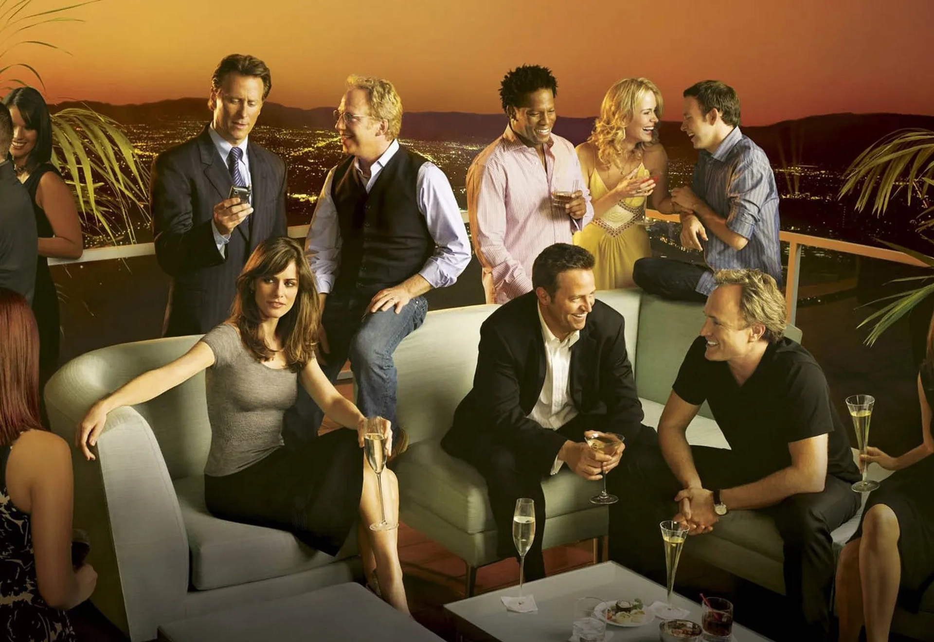 Amanda Peet, Matthew Perry, Steven Weber, Sarah Paulson, Timothy Busfield, D.L. Hughley, Bradley Whitford, and Nate Corddry in Studio 60 on the Sunset Strip (2006)