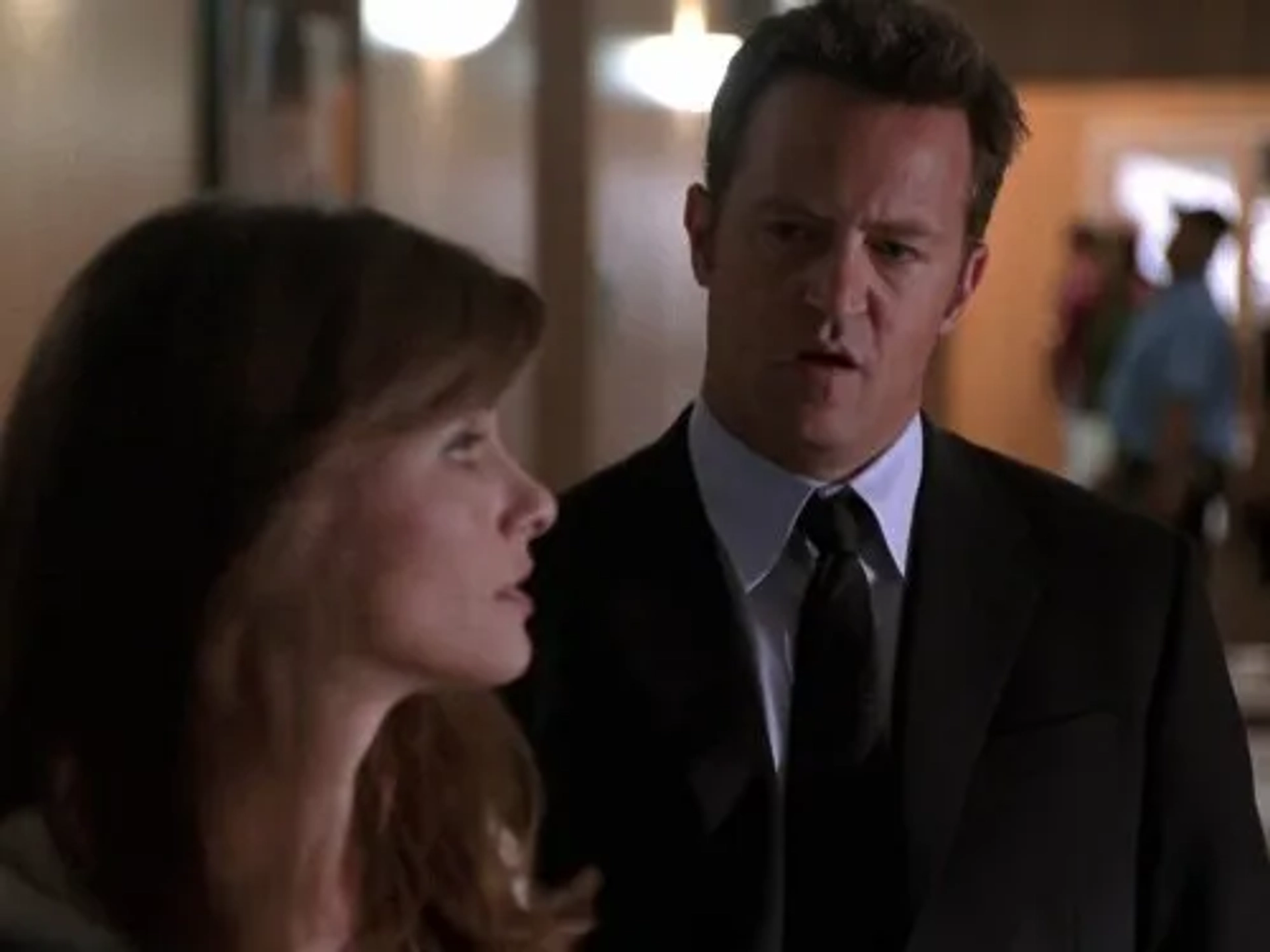 Amanda Peet and Matthew Perry in Studio 60 on the Sunset Strip (2006)