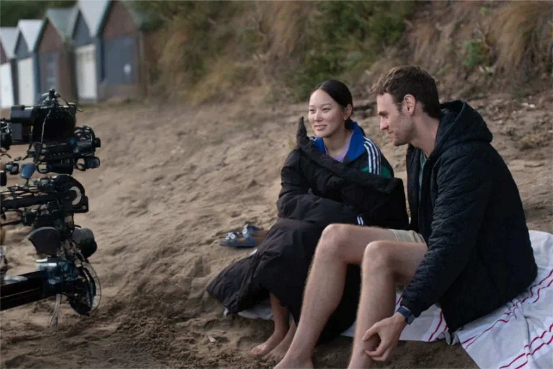 Charlie Vickers and Yerin Ha in The Survivors (2025)