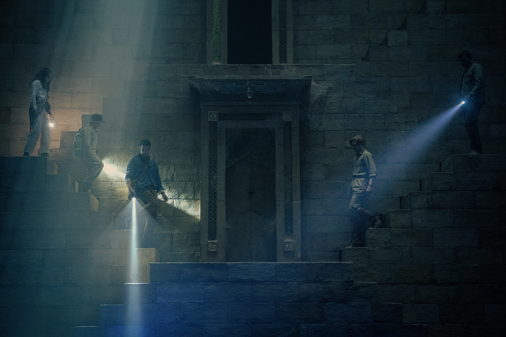 Natalie Portman, John Krasinski, Benjamin Chivers, Domhnall Gleeson, and Michael Epp in Fountain of Youth (2025)