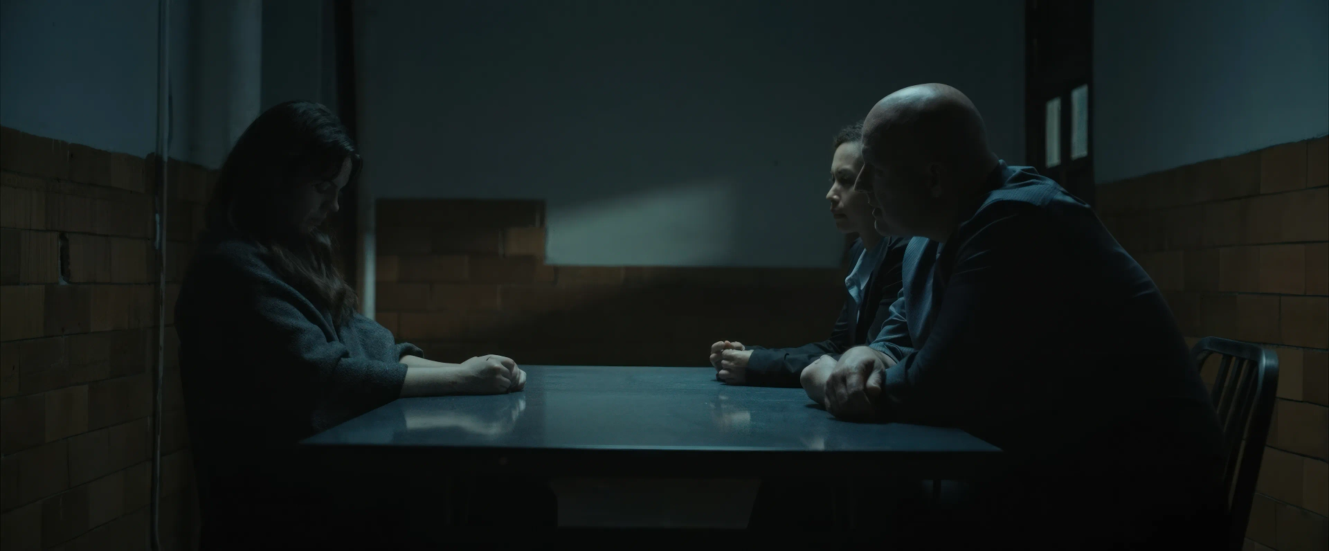 Shai Barcia, Greg Schneider, and Ellie O'Brien in It Feeds (2025)