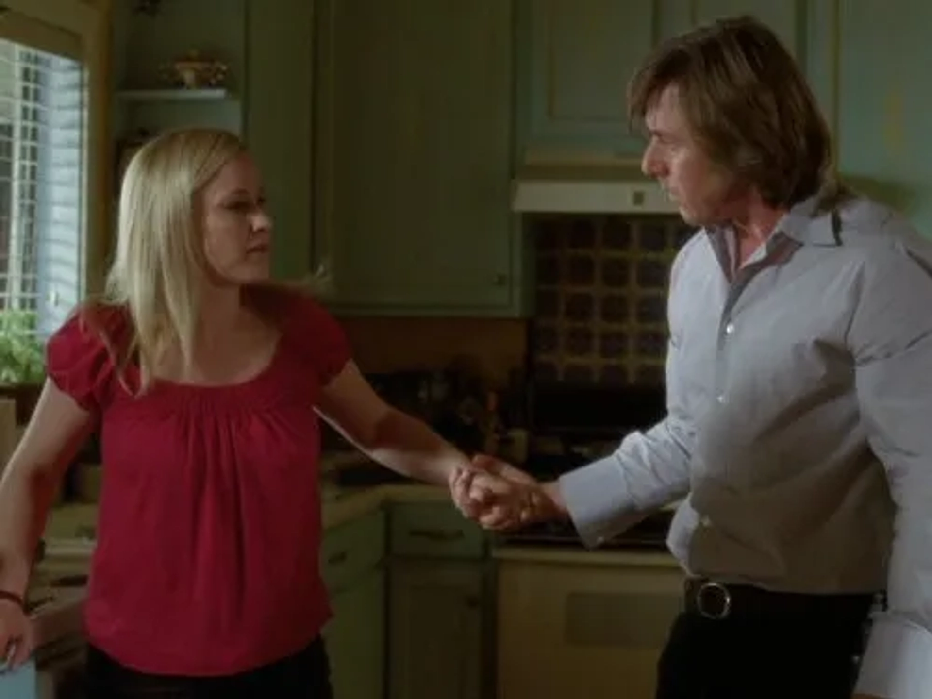 Patricia Arquette and Jake Weber in Medium (2005)
