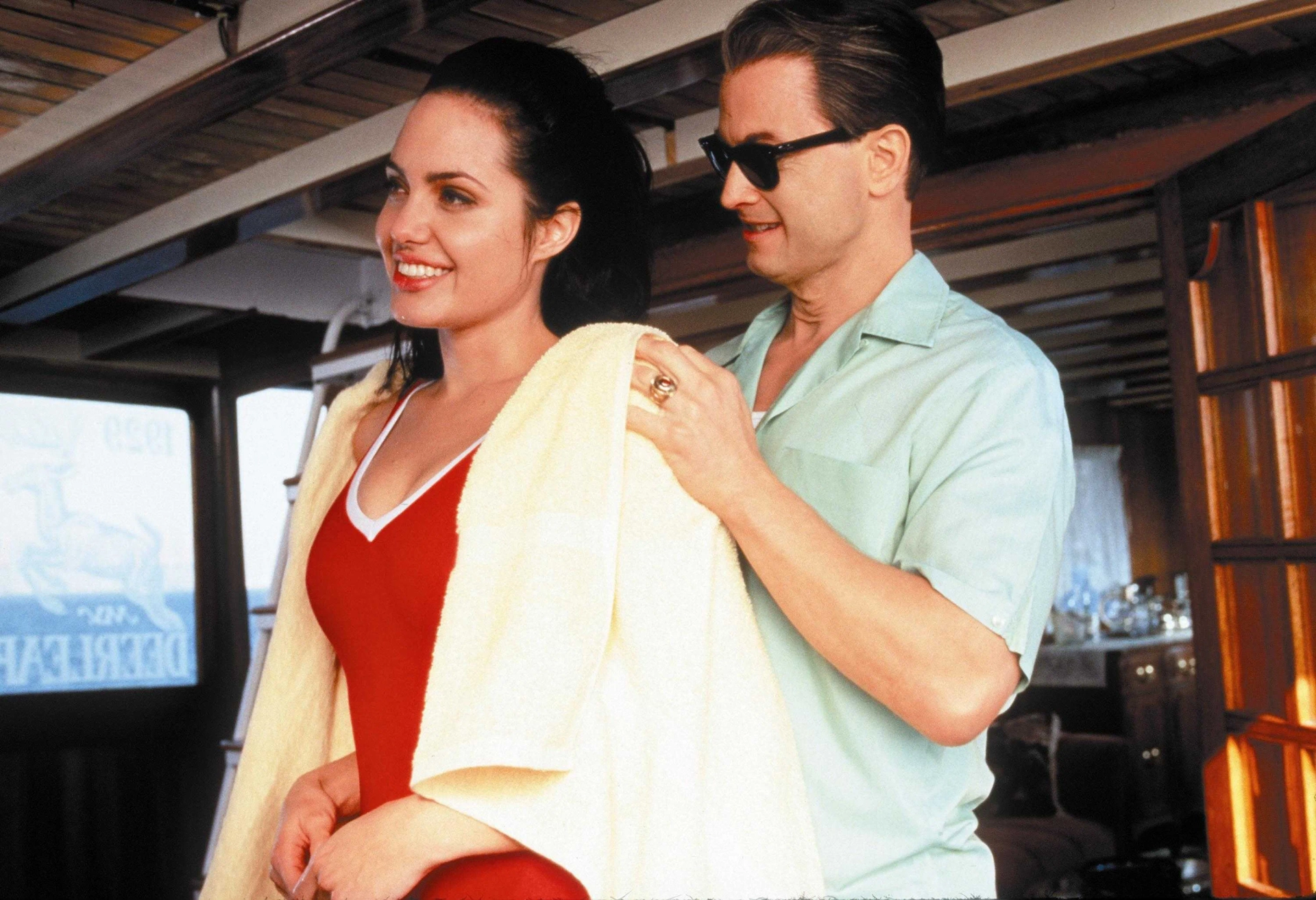 Gary Sinise and Angelina Jolie in George Wallace (1997)