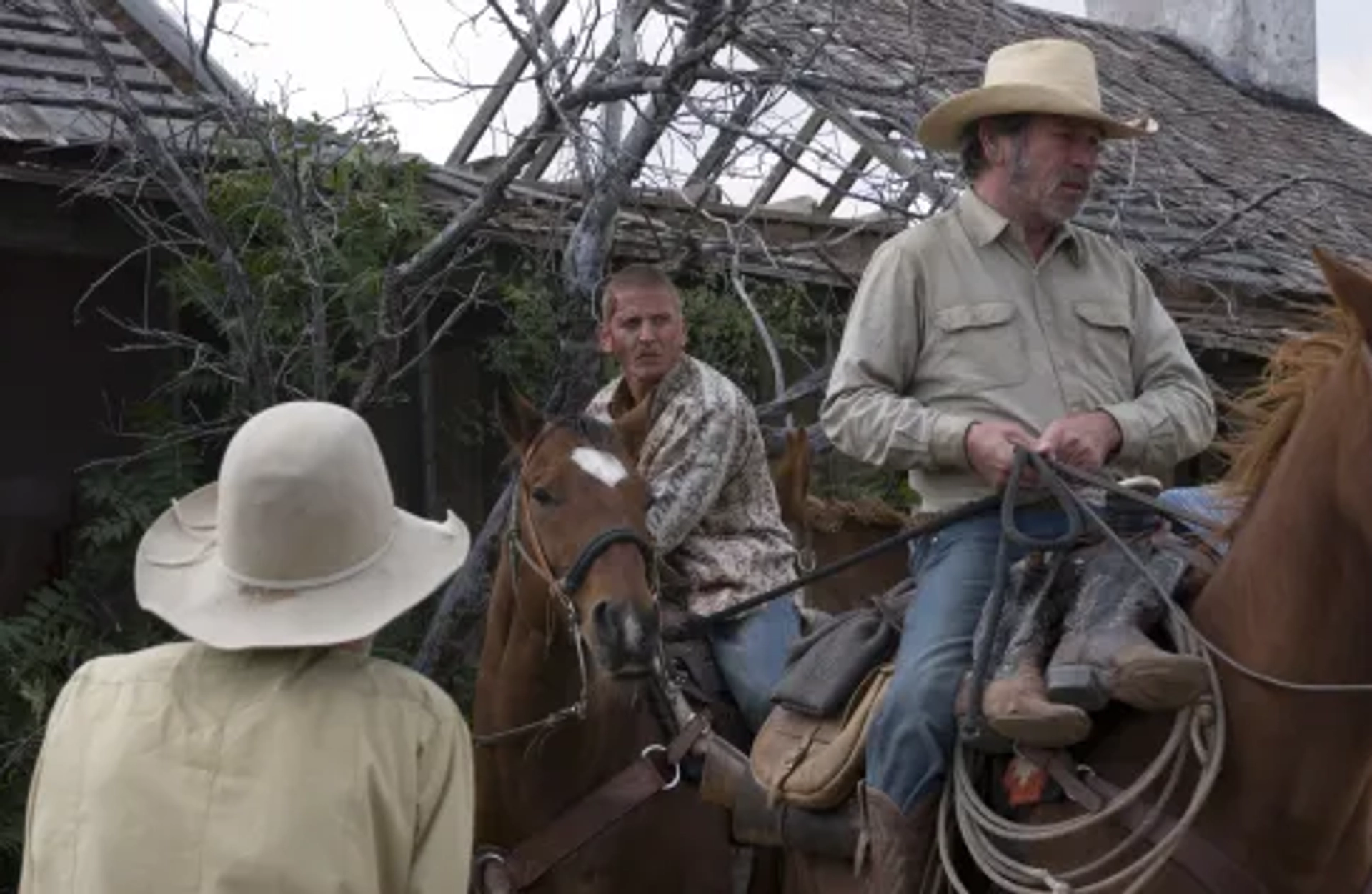 Tommy Lee Jones, Barry Pepper, and Levon Helm in The Three Burials of Melquiades Estrada (2005)