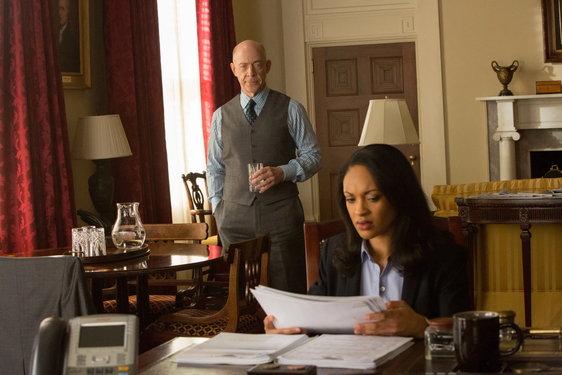 J.K. Simmons and Cynthia Addai-Robinson in The Accountant (2016)