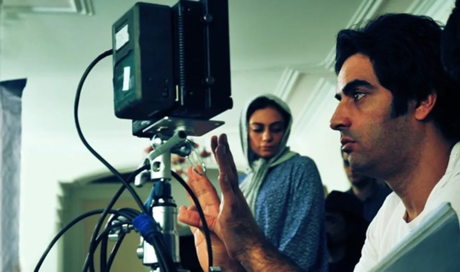 Yekta Naser and Manouchehr Hadi in Life Is Elsewhere (2014)
