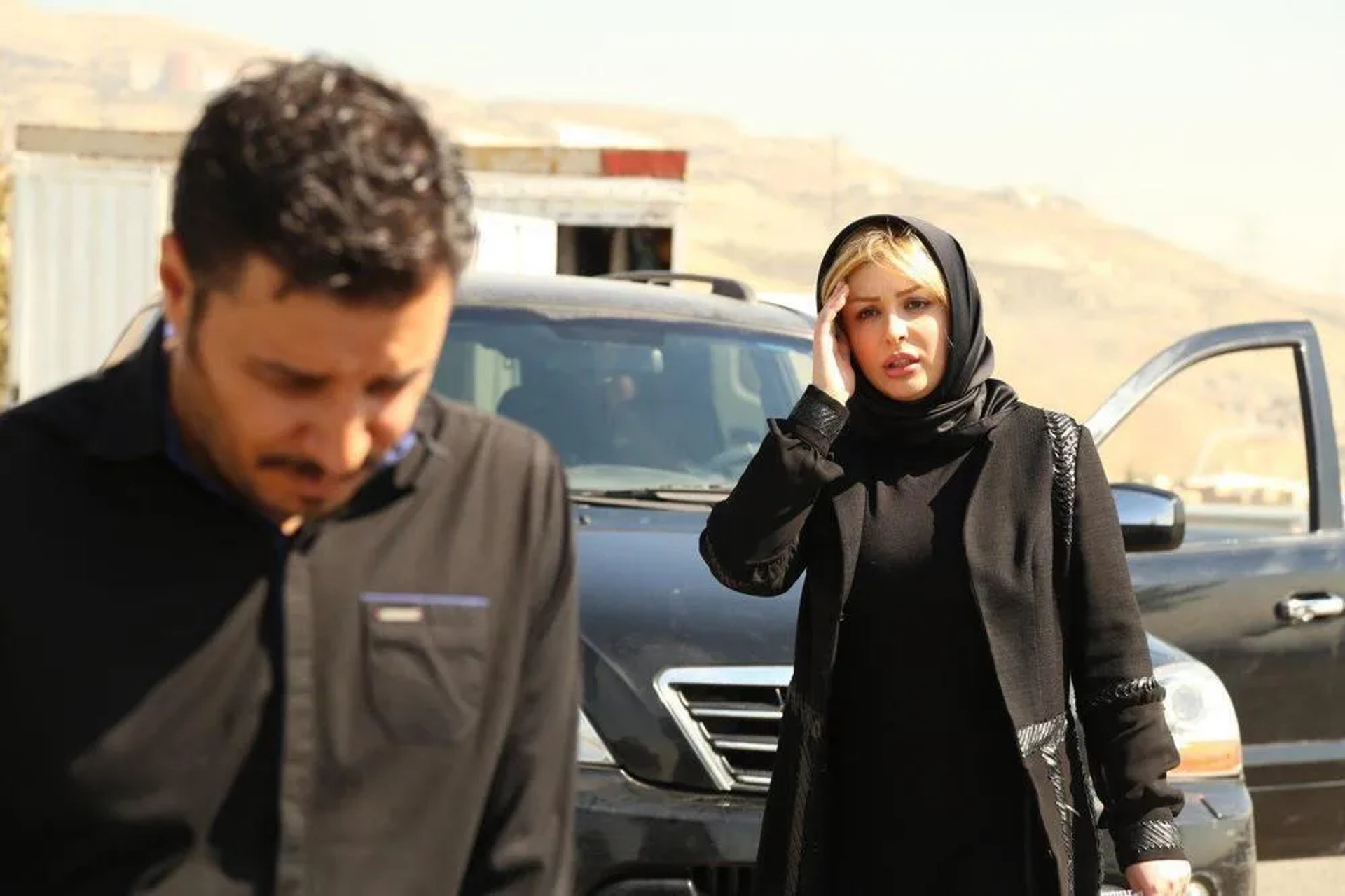 Niousha Zeighami and Javad Ezati in Reversed Seven (2017)