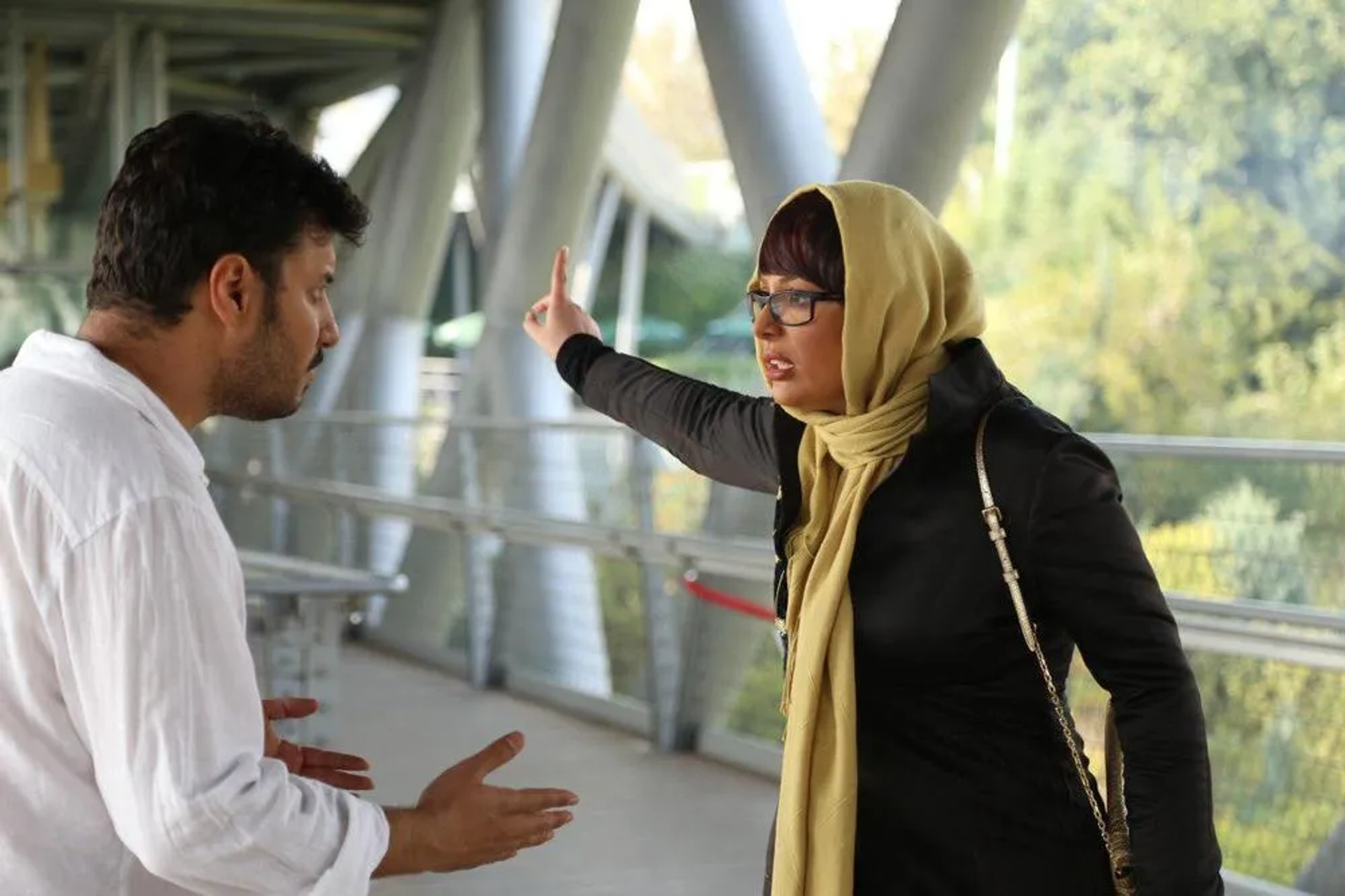 Niousha Zeighami and Javad Ezati in Reversed Seven (2017)