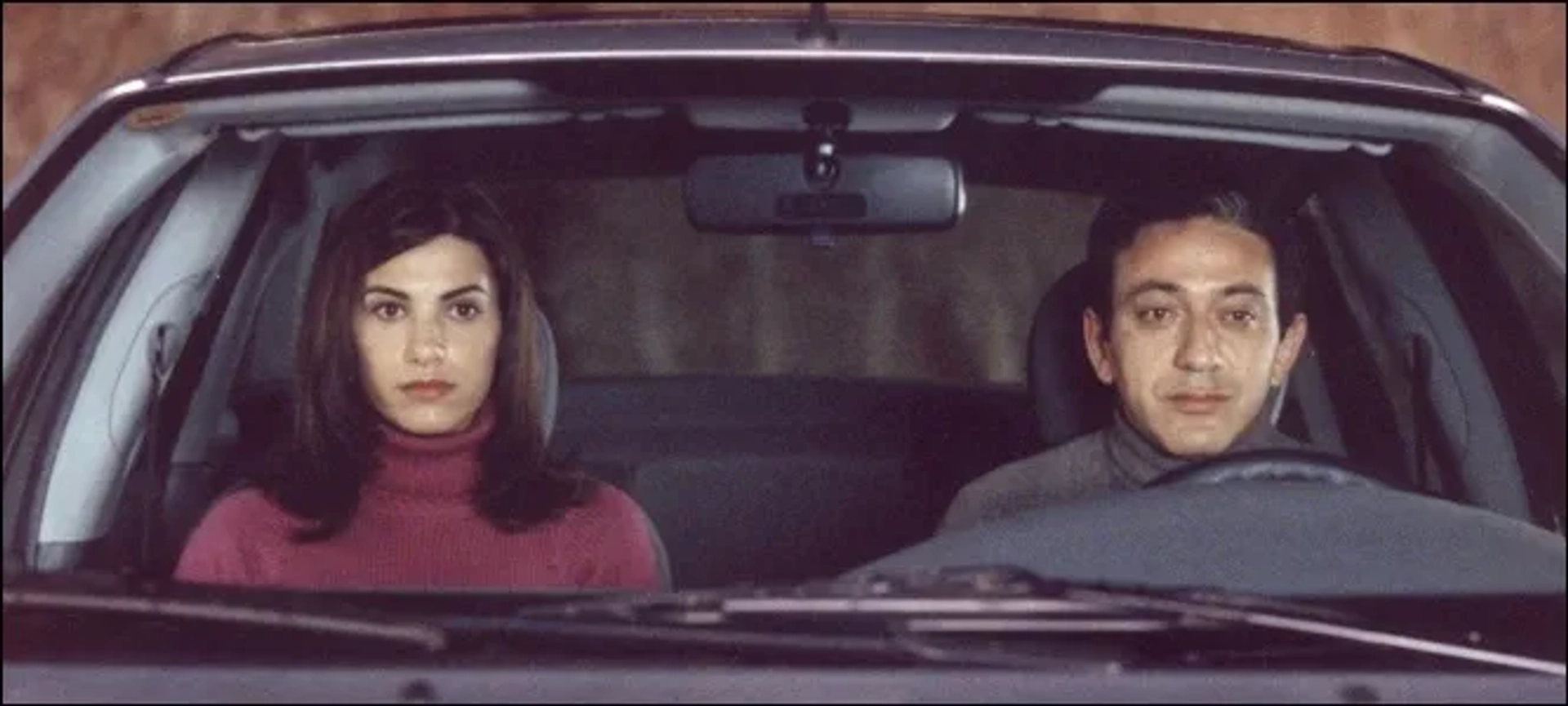 Elia Suleiman and Manal Khader in Divine Intervention (2002)