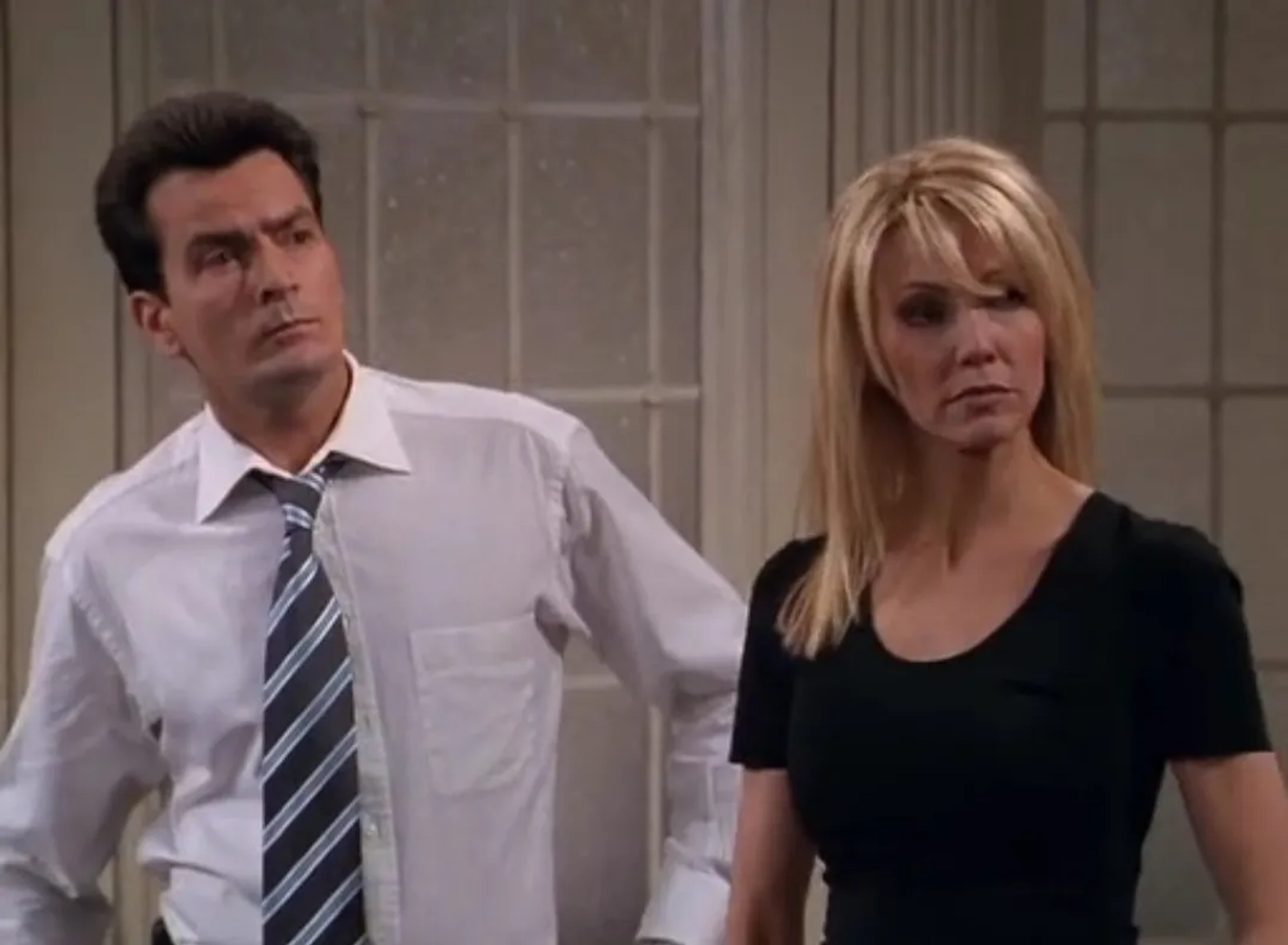 Heather Locklear and Charlie Sheen in Spin City (1996)