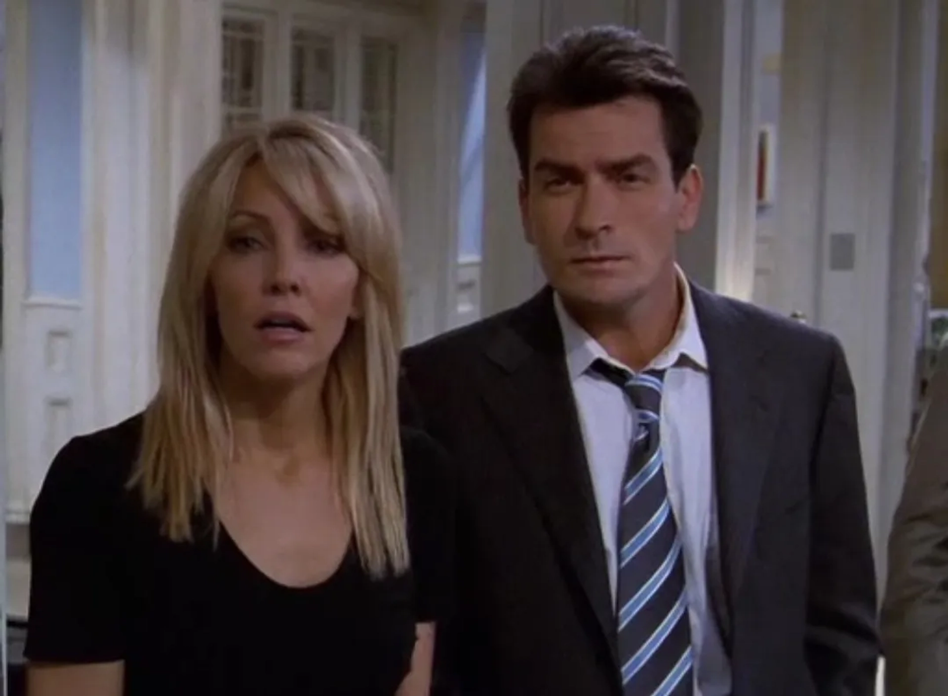 Heather Locklear and Charlie Sheen in Spin City (1996)