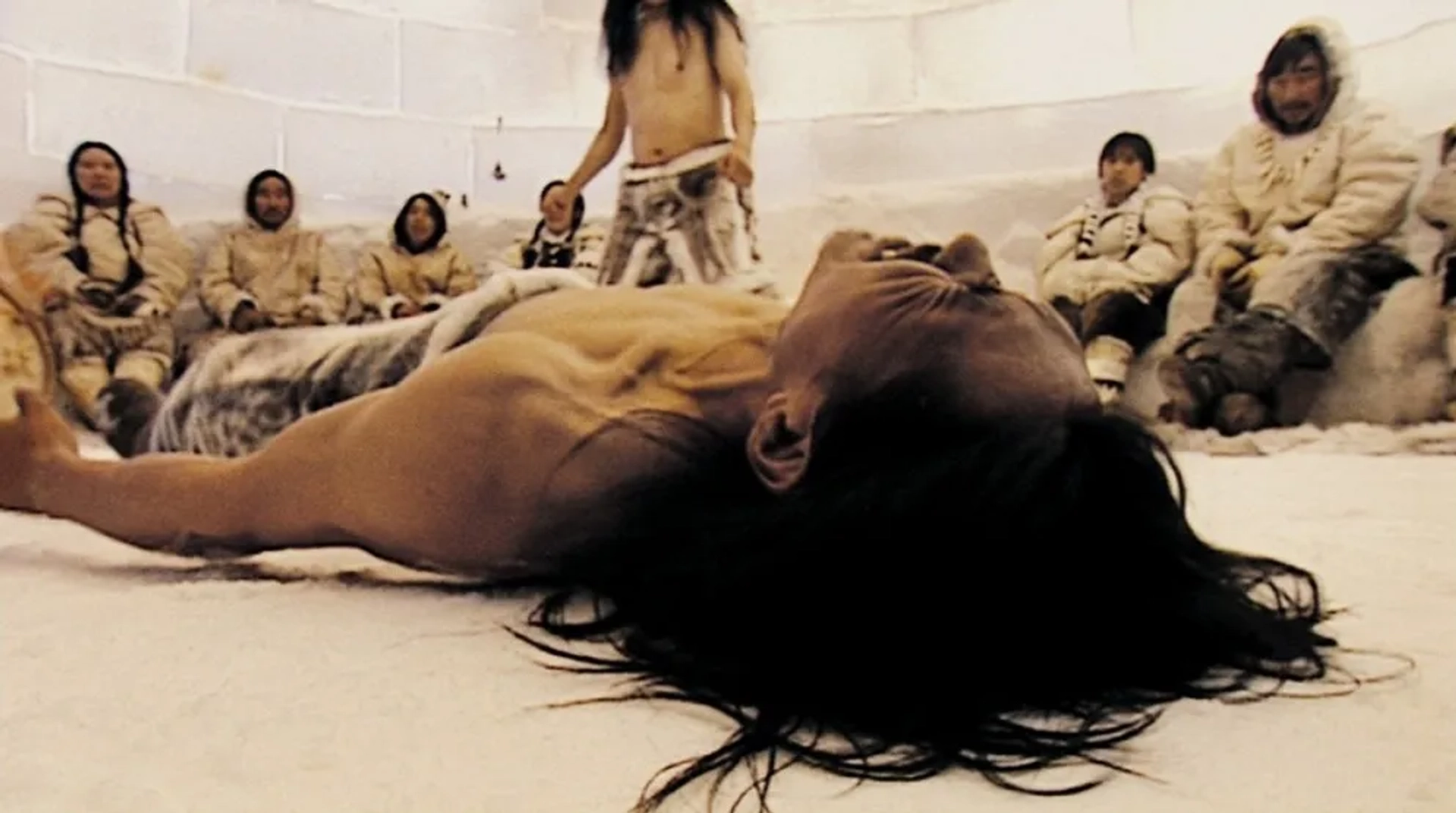 Peter-Henry Arnatsiaq and Eugene Ipkarnak in Atanarjuat: The Fast Runner (2001)