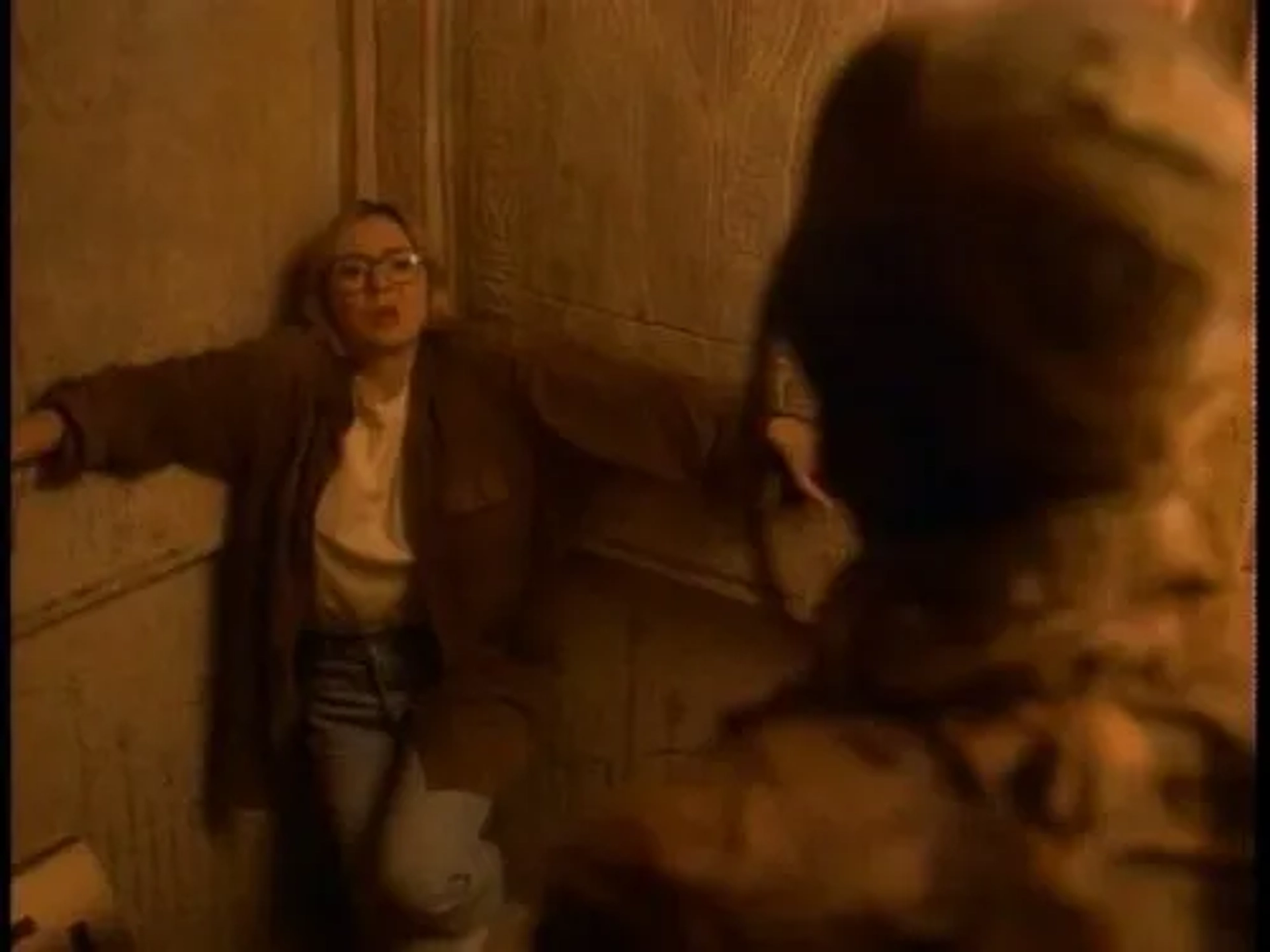 Ivan E. Roth and Nina Siemaszko in Tales from the Crypt (1989)