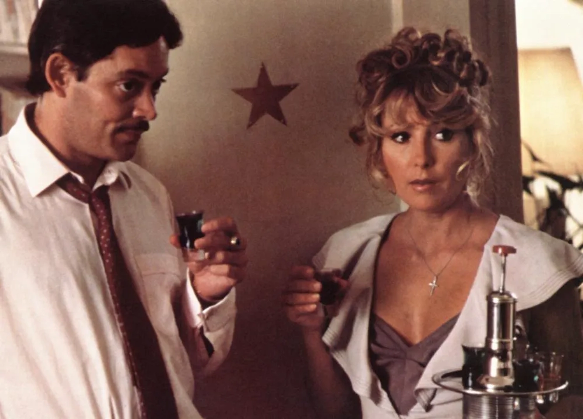 Teri Garr and Raul Julia in The Escape Artist (1982)