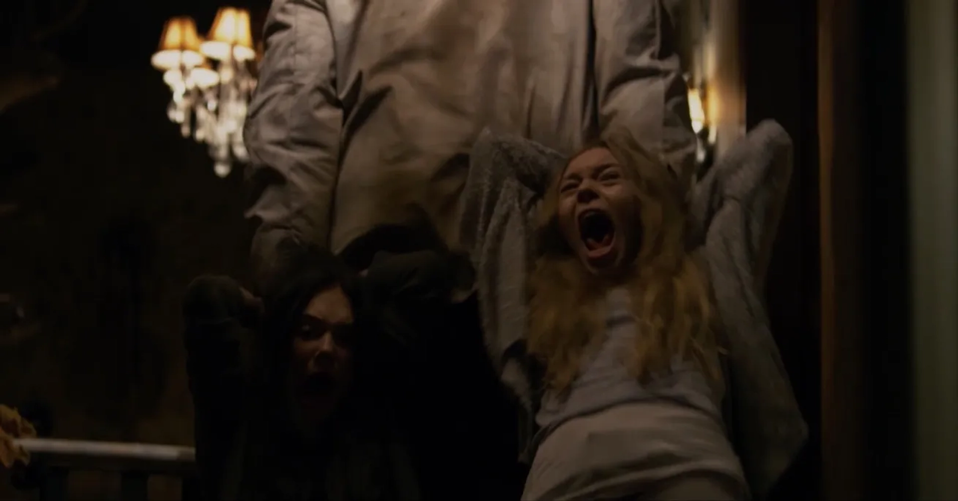 Rob Archer, Emilia Jones, and Taylor Hickson in Incident in a Ghostland (2018)