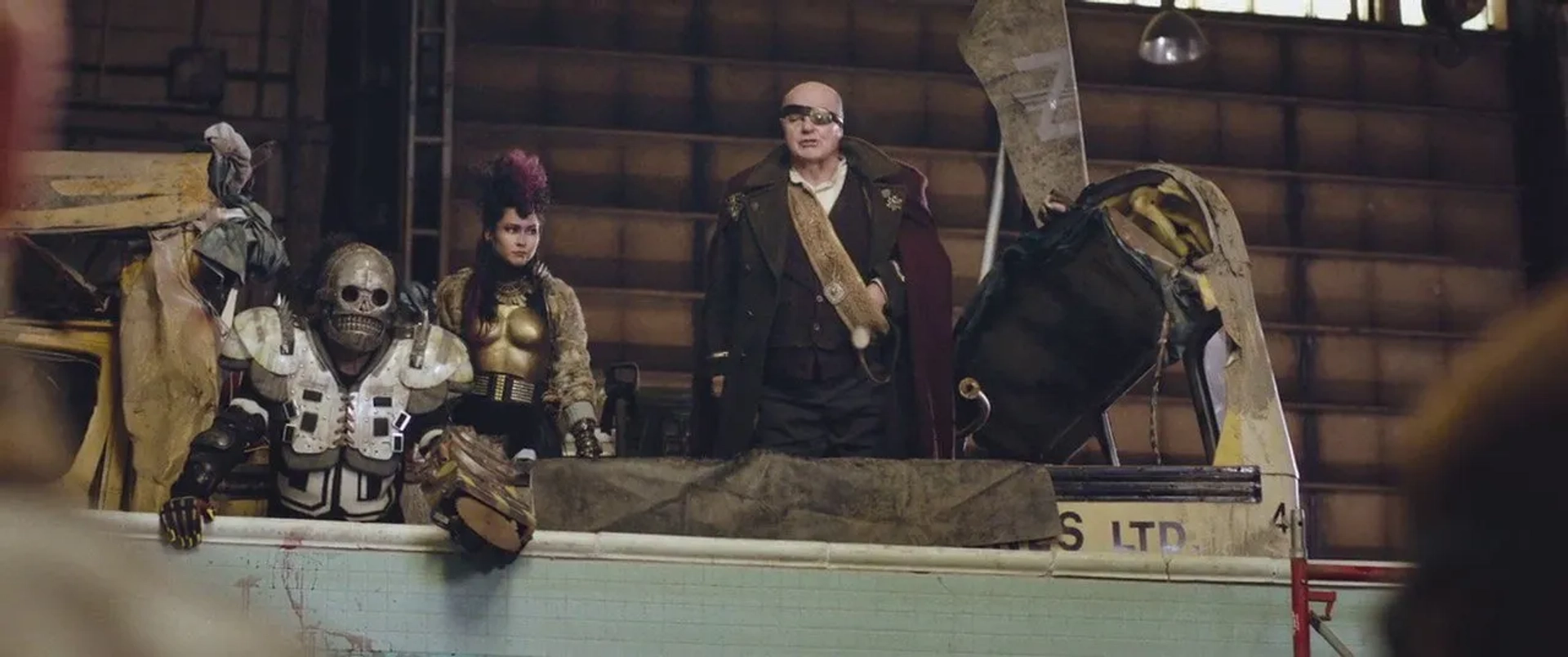Michael Ironside, Edwin Wright, and Orphée Ladouceur-Nguyen in Turbo Kid (2015)