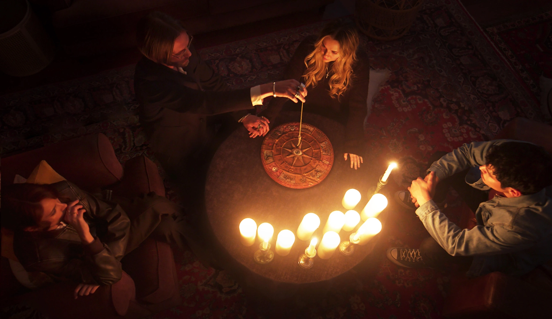 Charlie Tahan, Jamie Campbell Bower, Madison Iseman, and Aaron Dominguez in Witchboard (2024)