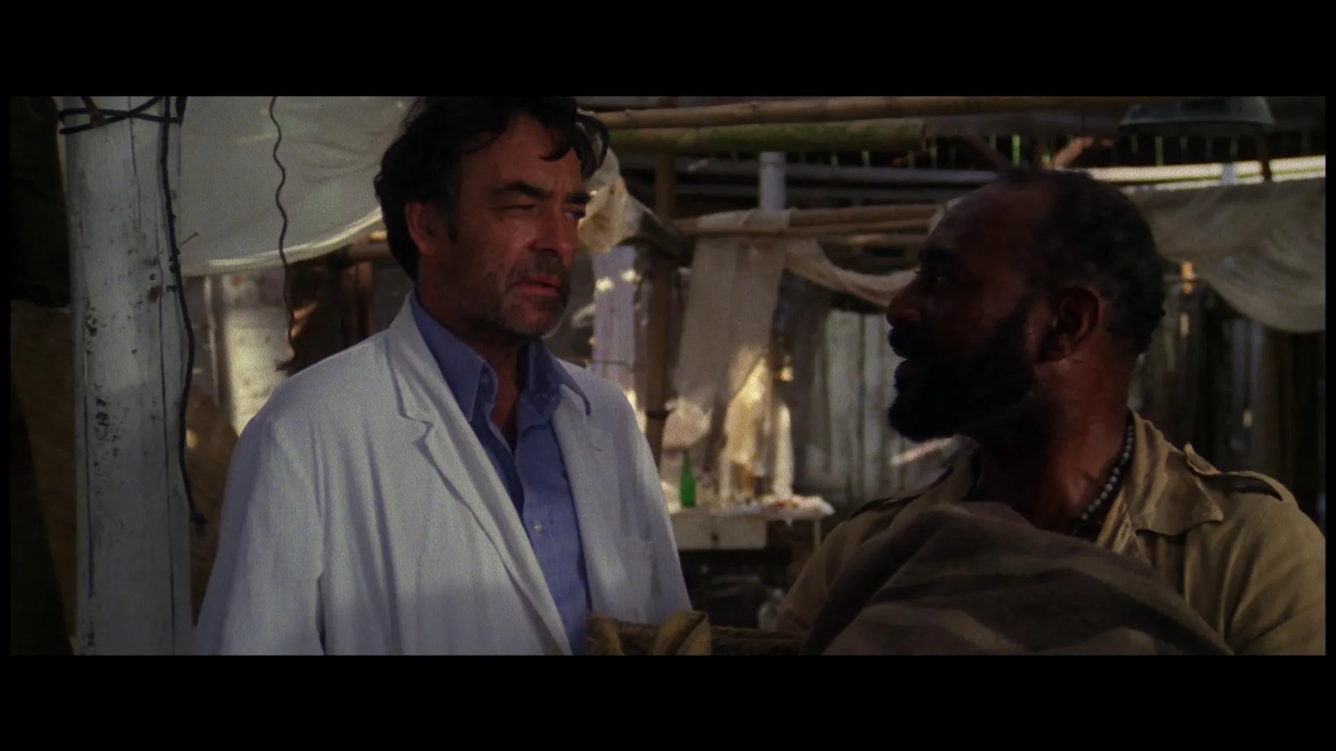 Dakar and Richard Johnson in Zombie (1979)