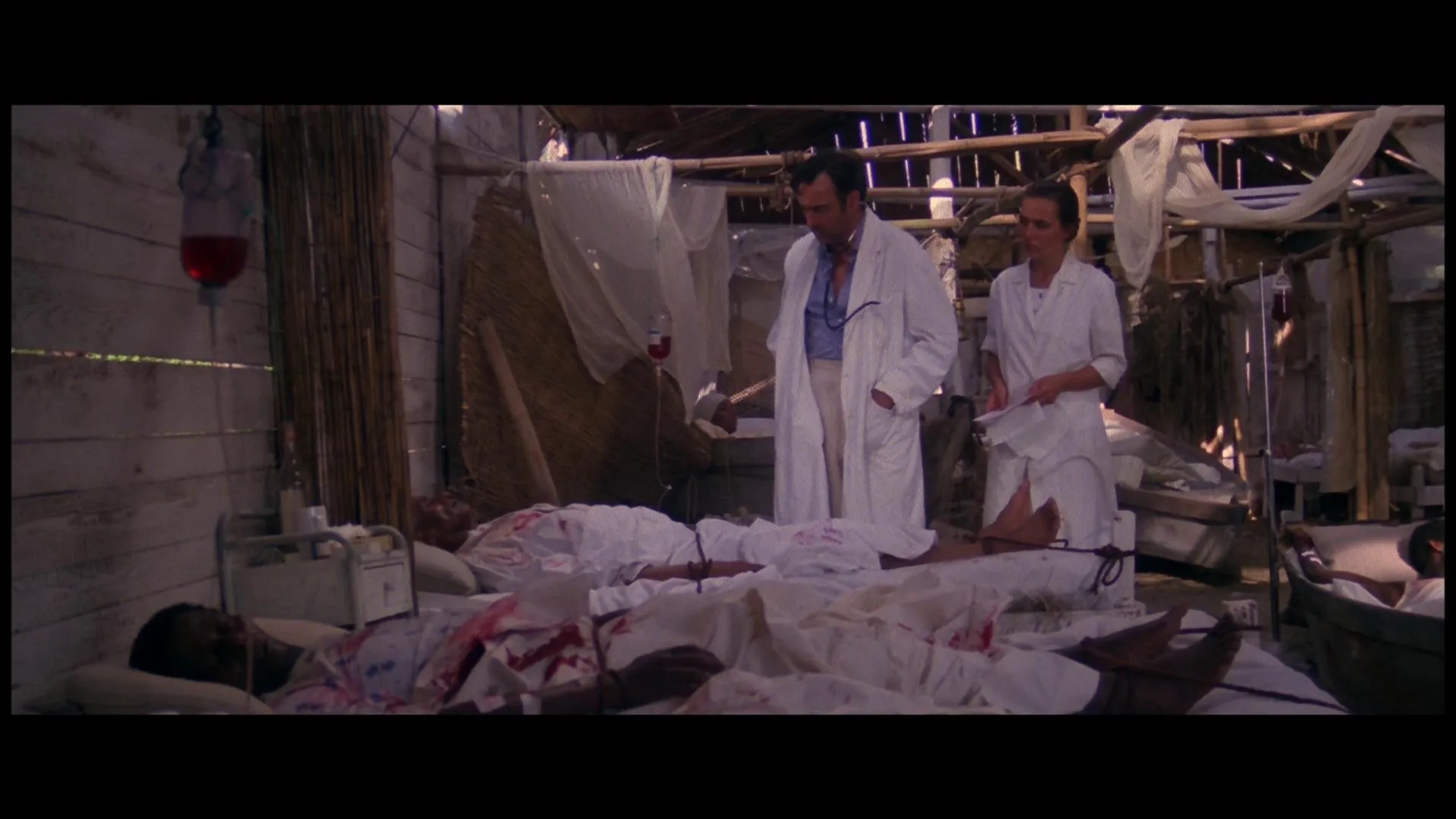 Stefania D'Amario and Richard Johnson in Zombie (1979)