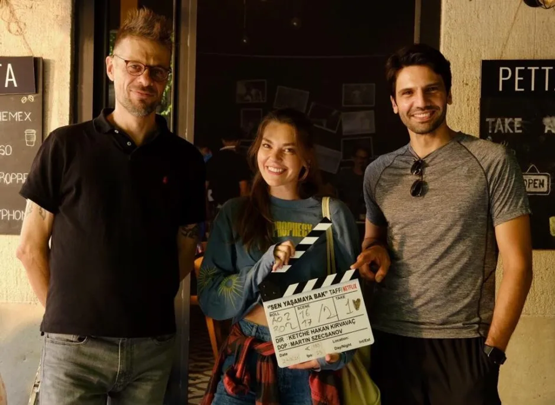 Kaan Urgancioglu, Asli Enver, and Ketche in In Good Hands (2022)