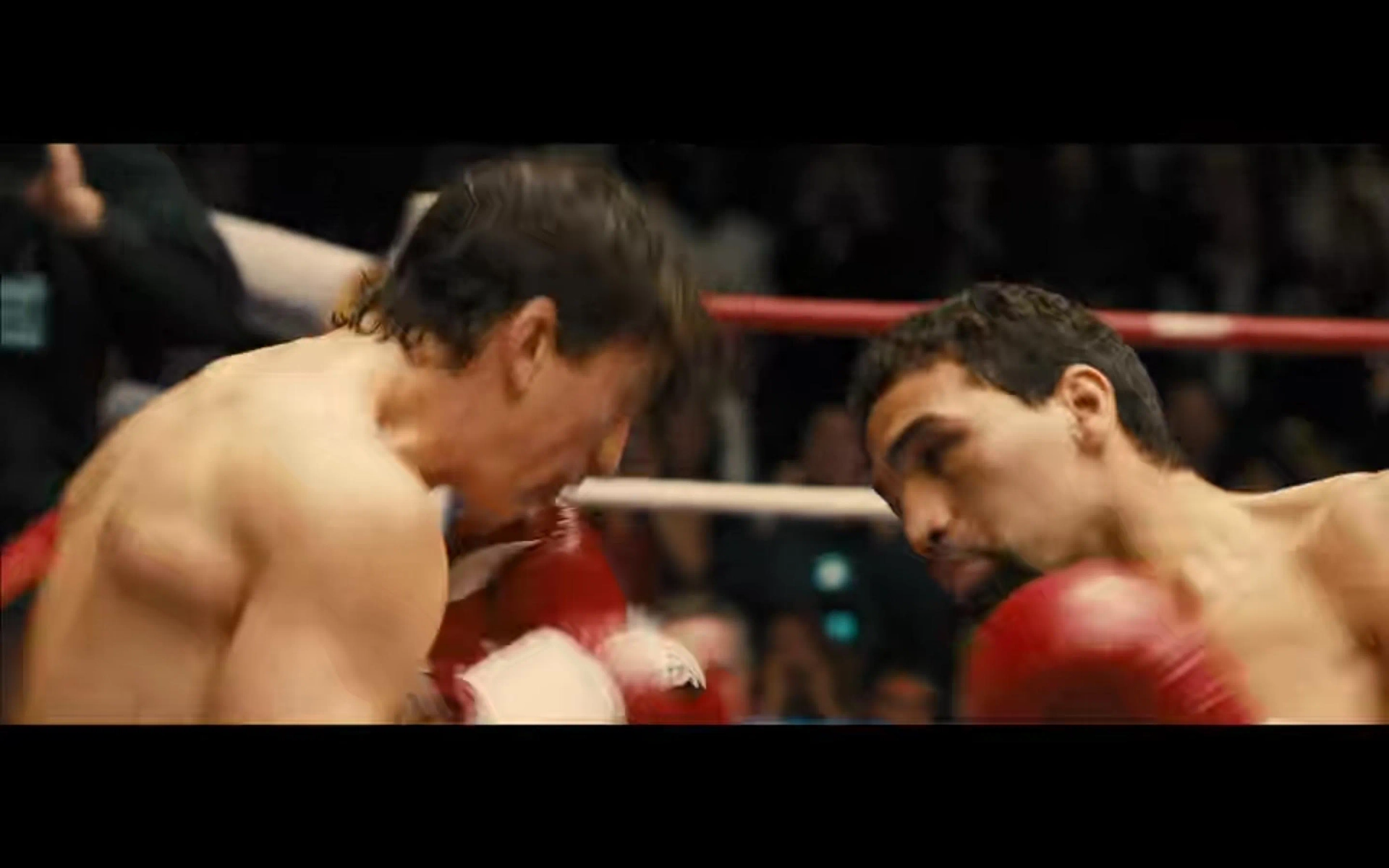 Miles Teller and Edwin Rodriguez in Bleed for This (2016)