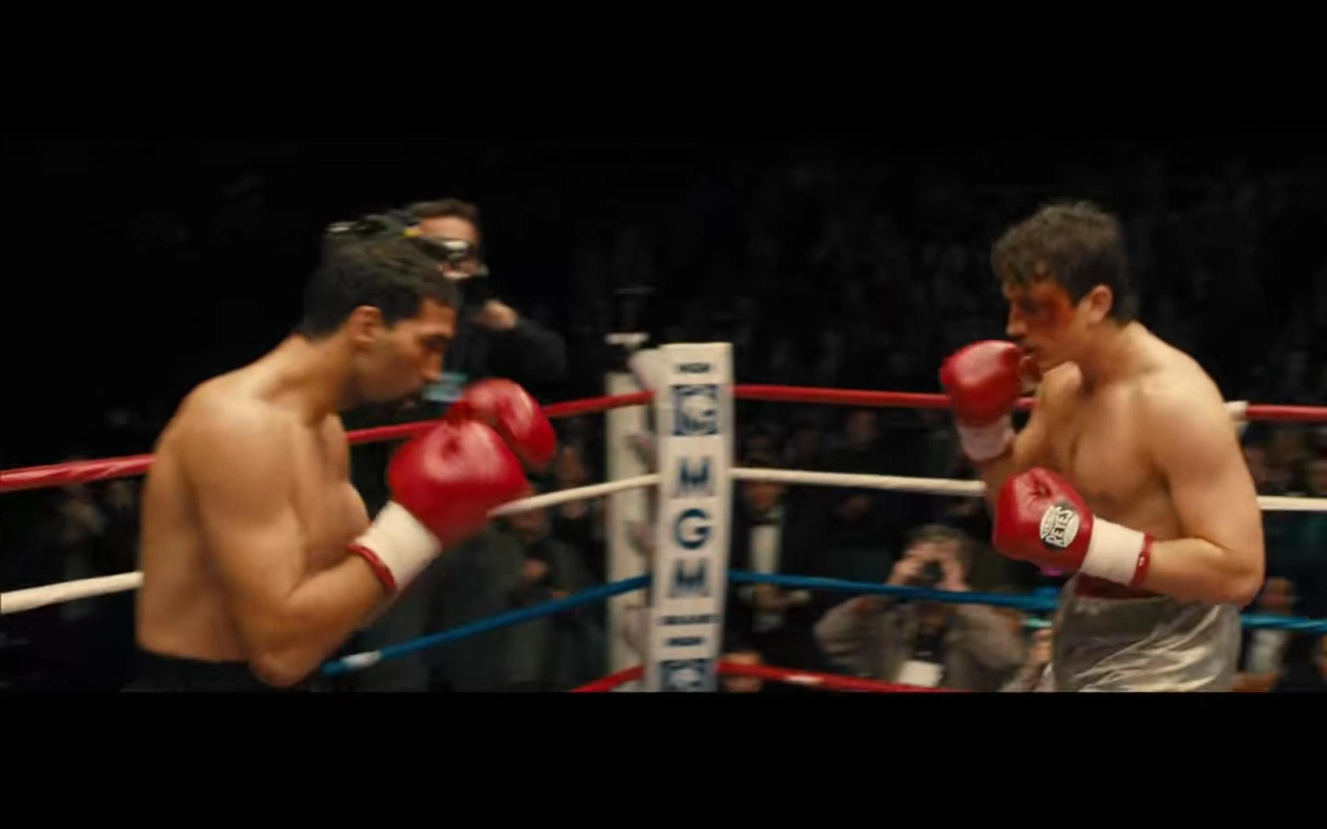 Miles Teller and Edwin Rodriguez in Bleed for This (2016)