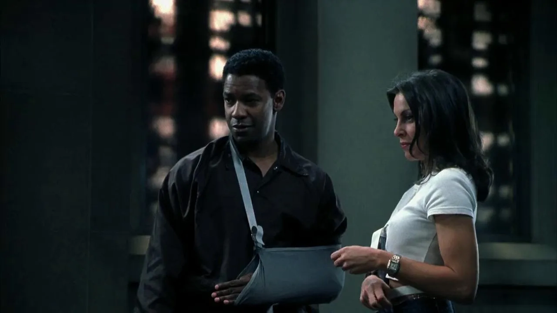 Denzel Washington and Heather Wahlquist in John Q (2002)