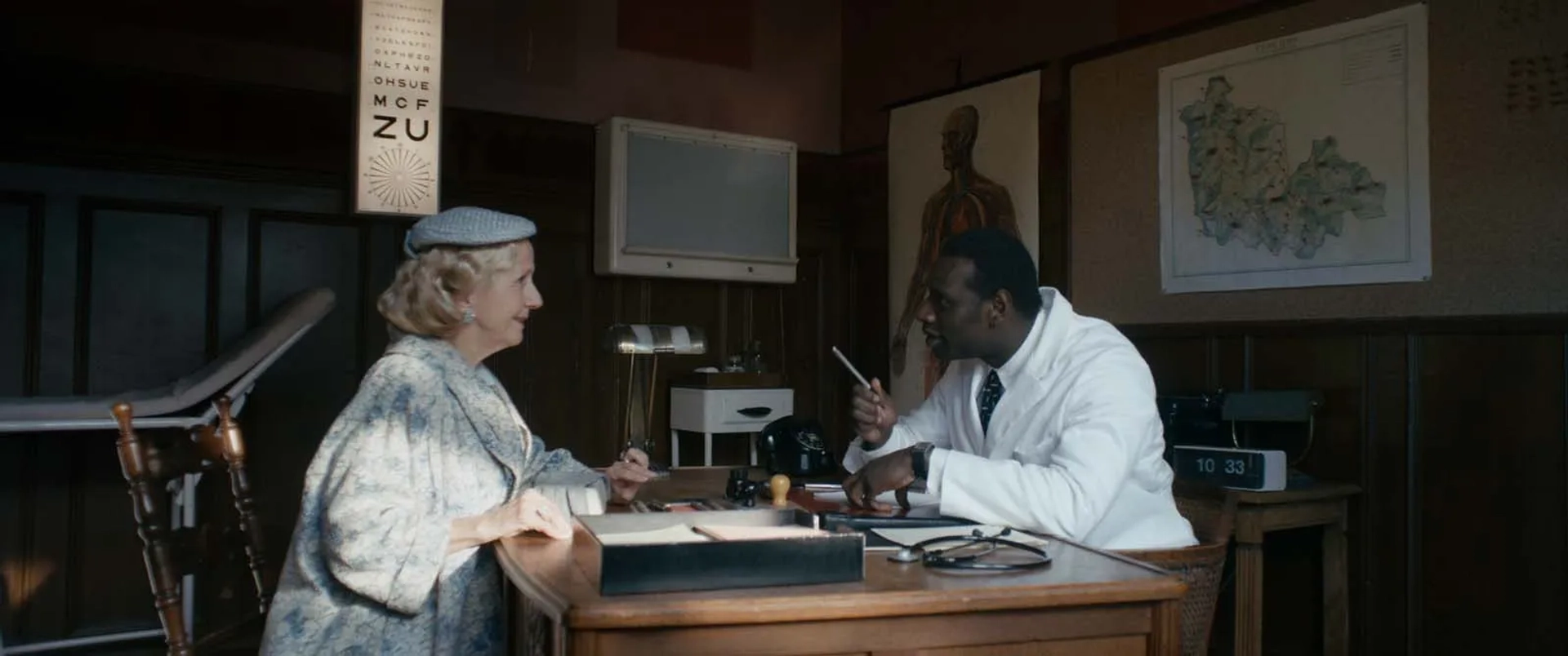 Hélène Vincent and Omar Sy in Knock (2017)