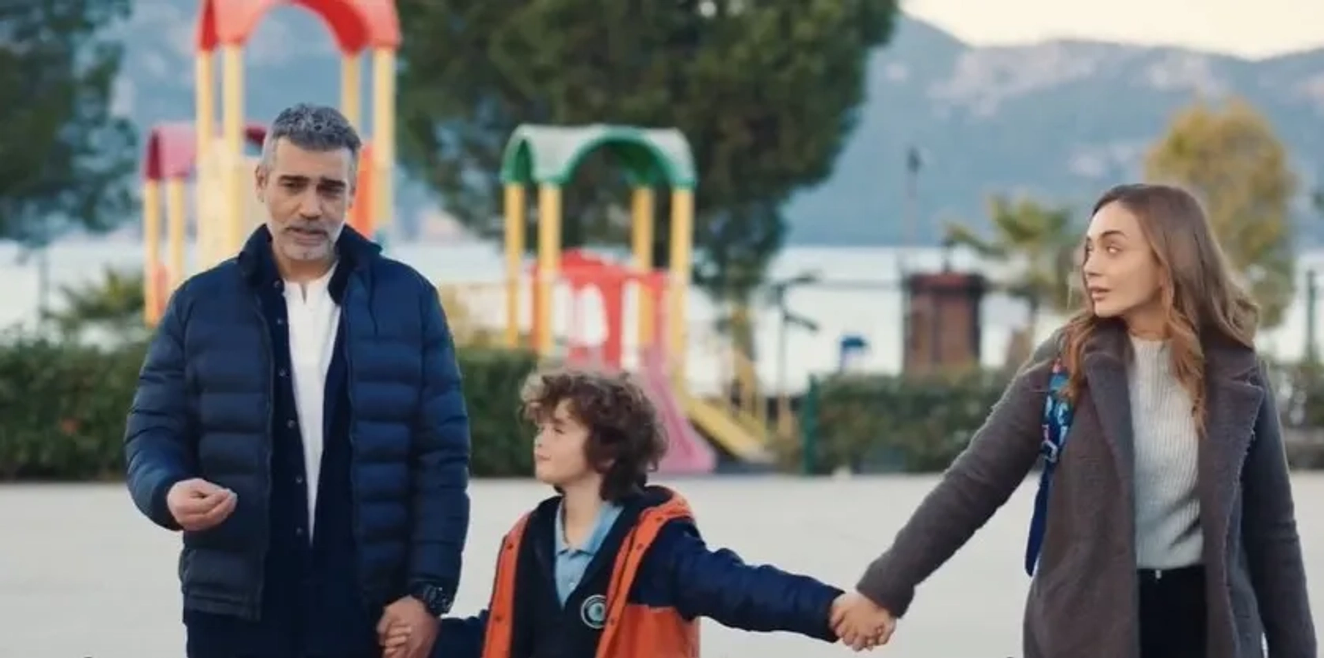 Yaman Arslan, Damla Sönmez, and Caner Cindoruk in The Blue Exile (2023)