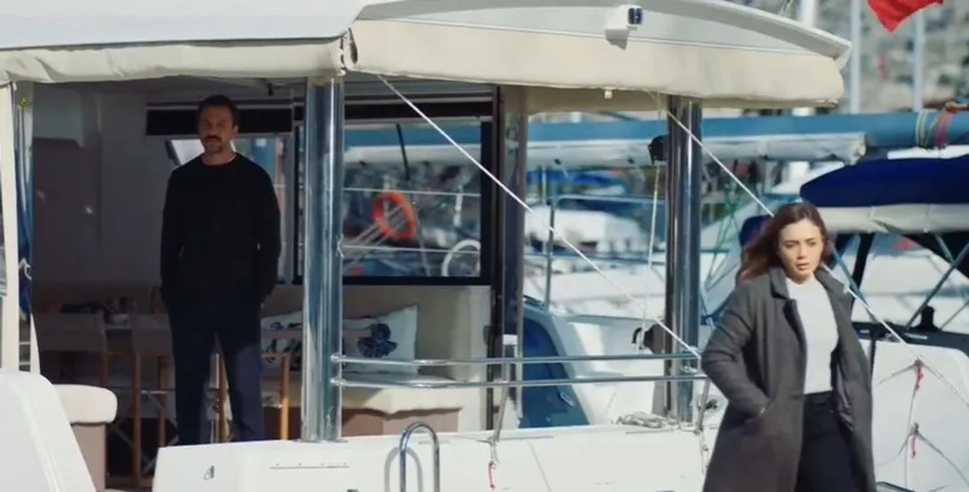 Damla Sönmez and Serkan Altunorak in The Blue Exile (2023)