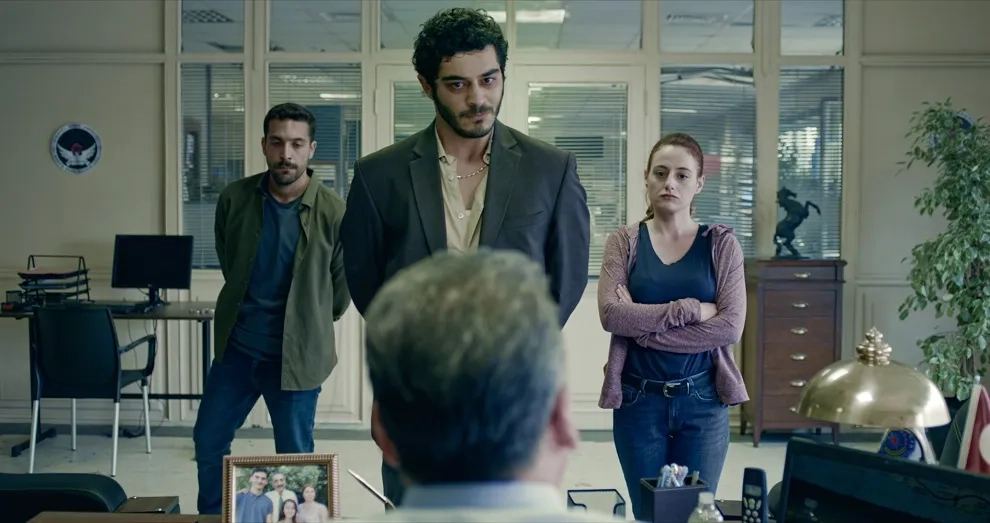 Nazli Bulum, Burak Deniz, and Cihat Suvarioglu in Interrupted (2020)